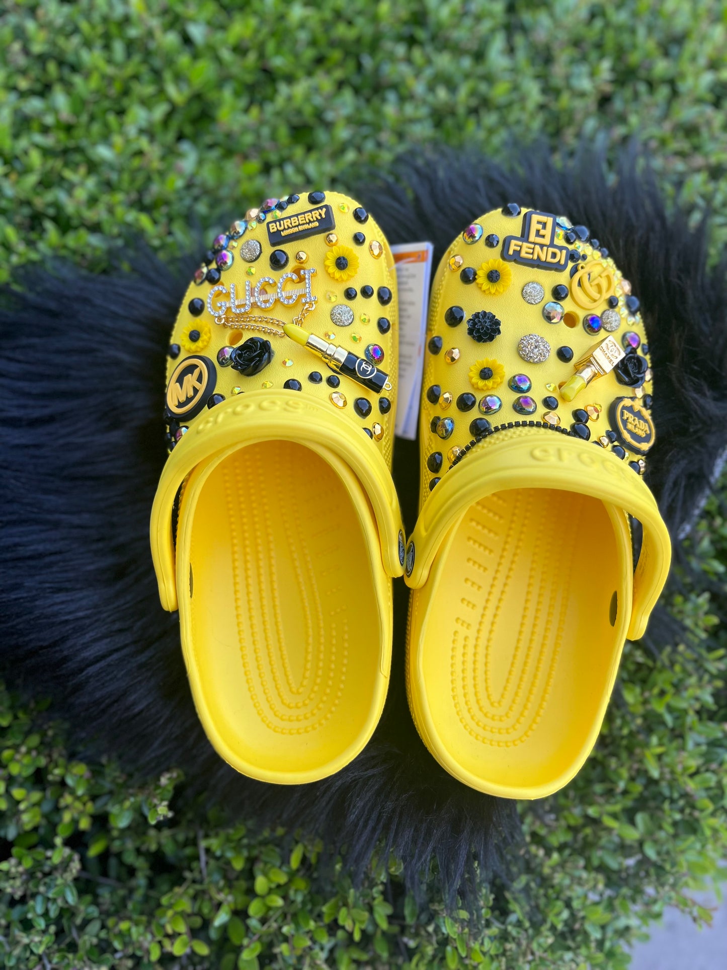 Yellow designer crocs